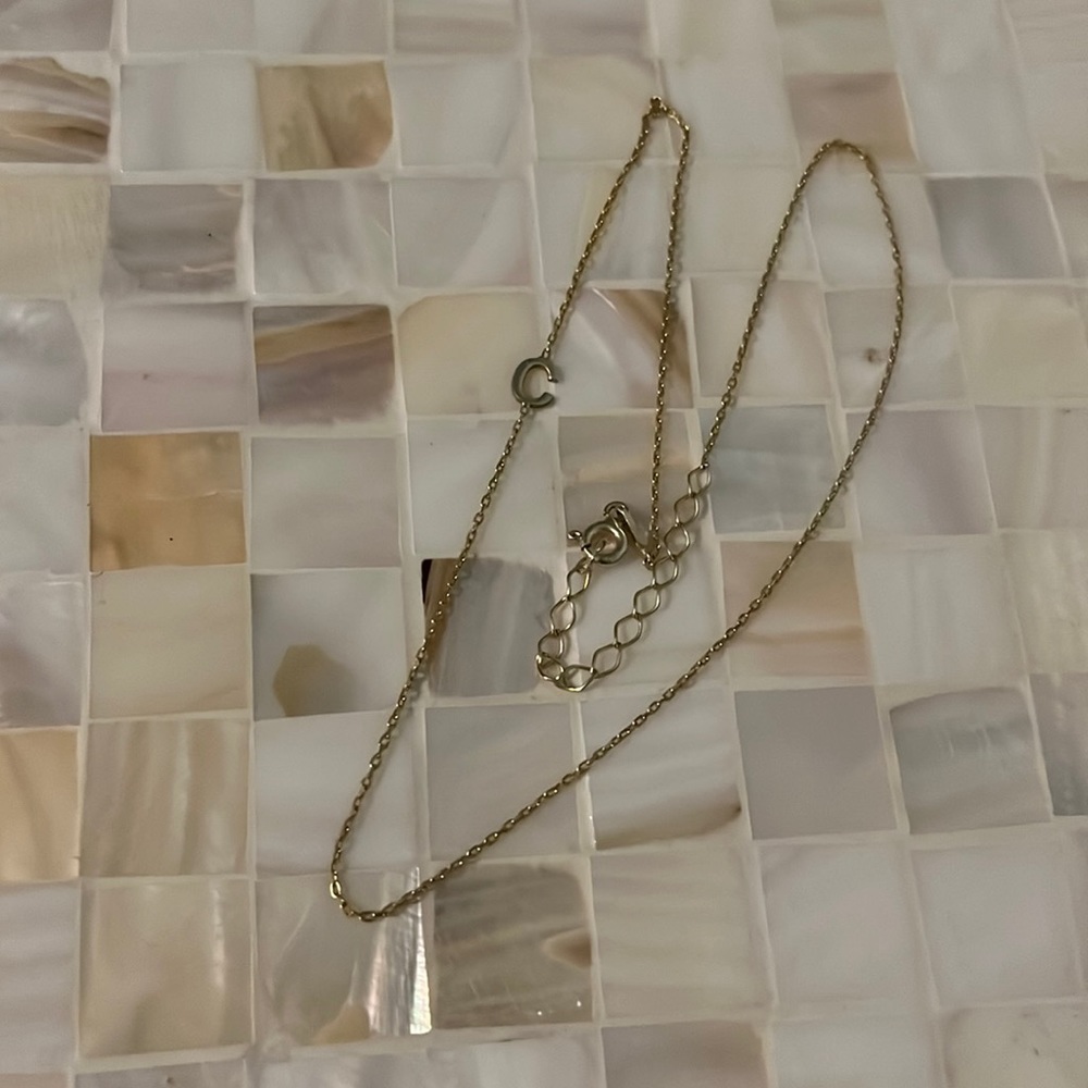 Gold “C” necklace